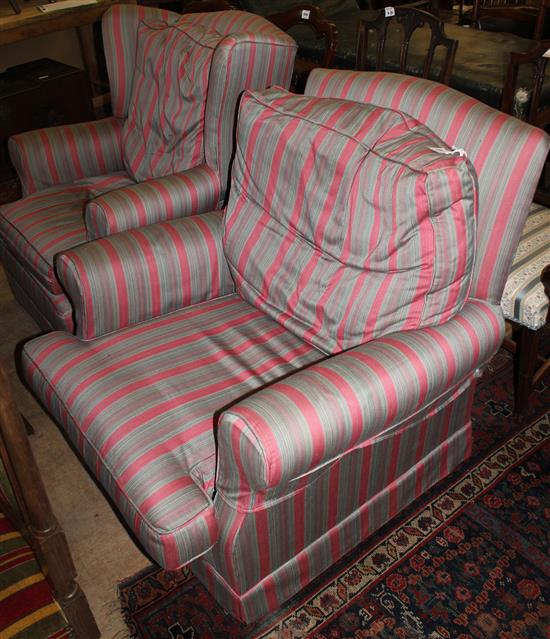 Pair of modern easy chairs covered in striped fabric
